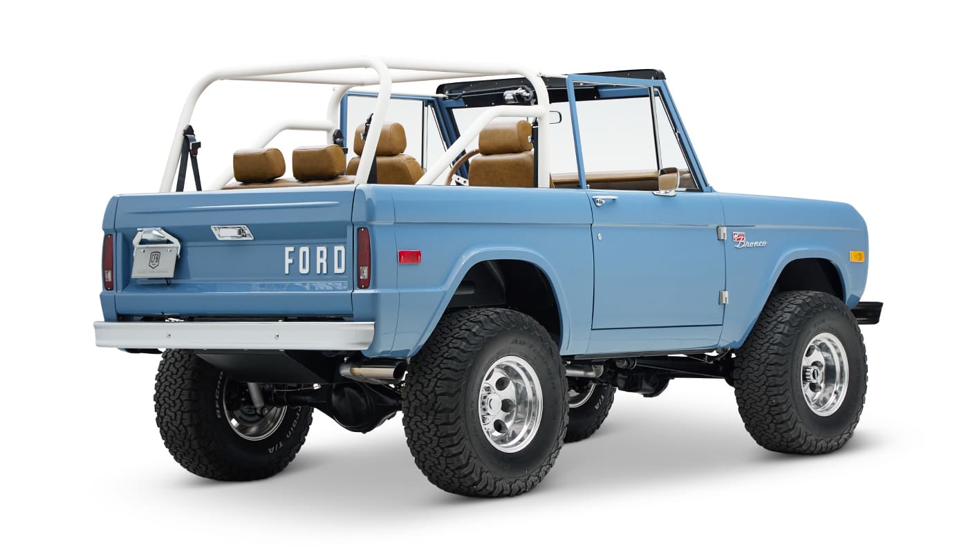 1974 classic ford bronco in stars & stripes blue with whiskey leather rear passenger